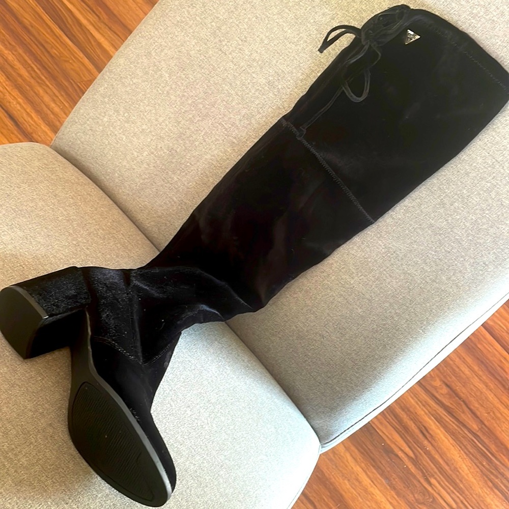 Velvet black knee high boots. Never been used